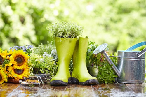 A gardener assessing site hazards and equipment safety